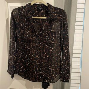 Guess women’s blouse; cheetah; good condition; size small